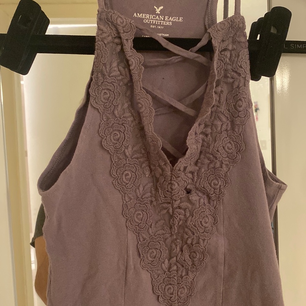 AMERICAN EAGLE PURPLE BODYSUIT with floral crisscross